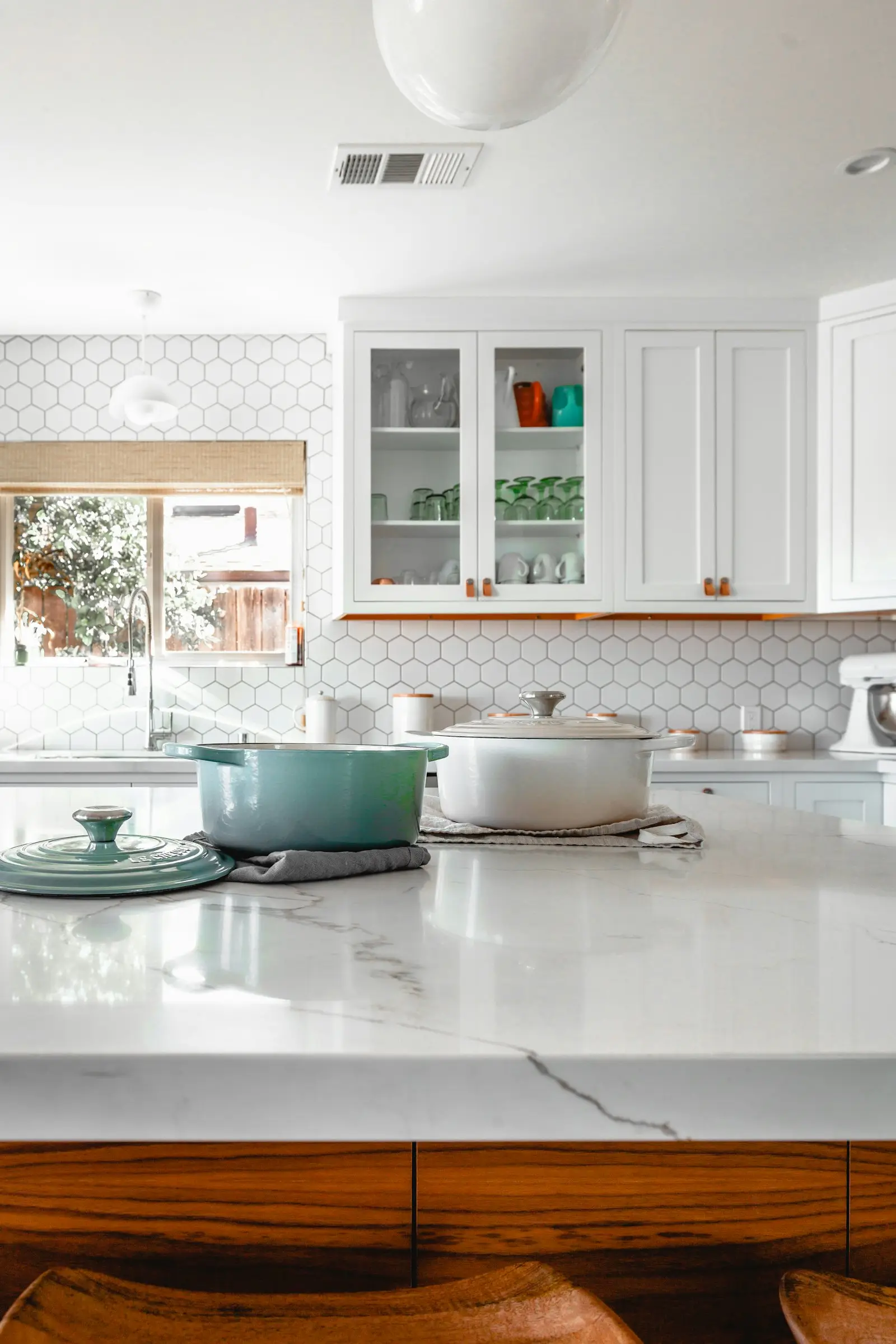 A bright residential kitchen with cabinets and counters. Arlington.